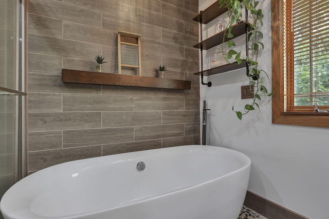 1859 State Route 257 N, Ostrander, OH 43061 - bathroom featuring a freestanding bath and baseboards