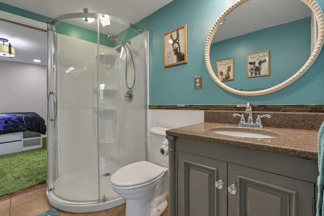 1859 State Route 257 N, Ostrander, OH 43061 - full bathroom with vanity, a stall shower, tile patterned flooring, and wainscoting