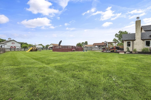 1859 State Route 257 N, Ostrander, OH 43061 - fenced backyard featuring a deck and a playground