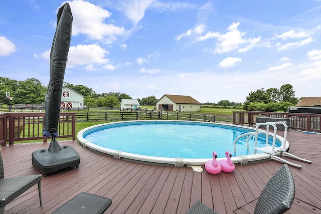 1859 State Route 257 N, Ostrander, OH 43061 - view of swimming pool featuring a deck and an outbuilding
