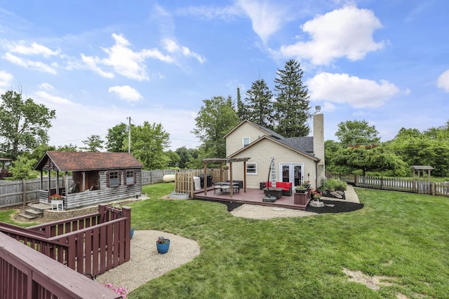 1859 State Route 257 N, Ostrander, OH 43061 - fenced backyard featuring a deck, an outdoor structure, and outdoor lounge area