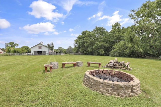 1859 State Route 257 N, Ostrander, OH 43061 - view of yard featuring an outdoor fire pit, an outbuilding, and a barn
