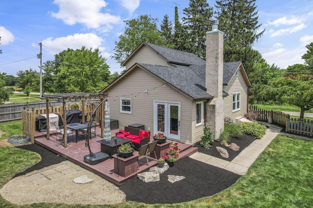 1859 State Route 257 N, Ostrander, OH 43061 - back of house with a shingled roof, a deck, a fenced backyard, and a chimney