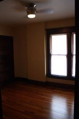 65 Warren St Unit 1/2, Columbus, OH 43215 - unfurnished room with dark wood-style flooring