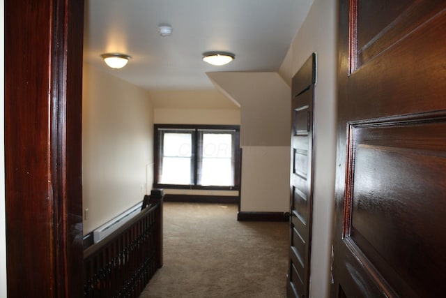 65 Warren St Unit 1/2, Columbus, OH 43215 - hallway featuring carpet flooring, a baseboard heating unit, and baseboards