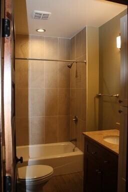 65 Warren St Unit 1/2, Columbus, OH 43215 - full bath with vanity, toilet, and shower / washtub combination