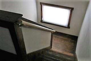 384 E 17th Ave, Columbus, OH 43201 - staircase with healthy amount of natural light and wood finished floors