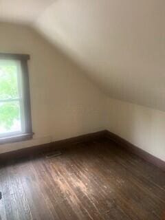 384 E 17th Ave, Columbus, OH 43201 - bonus room featuring vaulted ceiling, hardwood / wood-style flooring, and baseboards