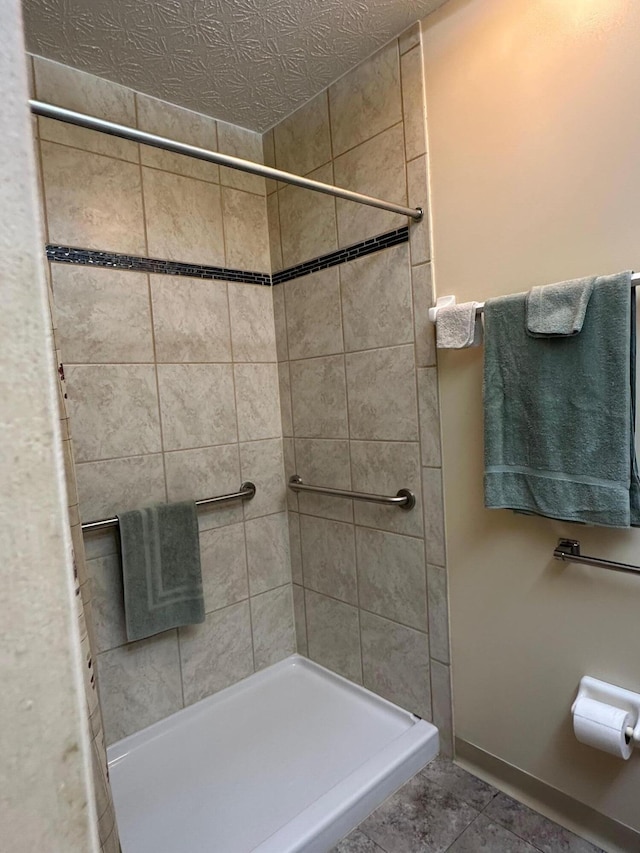 2328 Willowside Ln, Grove City, OH 43123 - bathroom featuring tiled shower and tile patterned floors