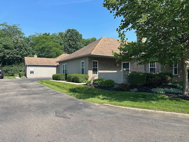 2328 Willowside Ln, Grove City, OH 43123 - single story home featuring brick siding, a front lawn, and roof with shingles