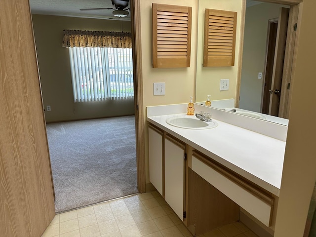 2328 Willowside Ln, Grove City, OH 43123 - bathroom featuring a ceiling fan and vanity