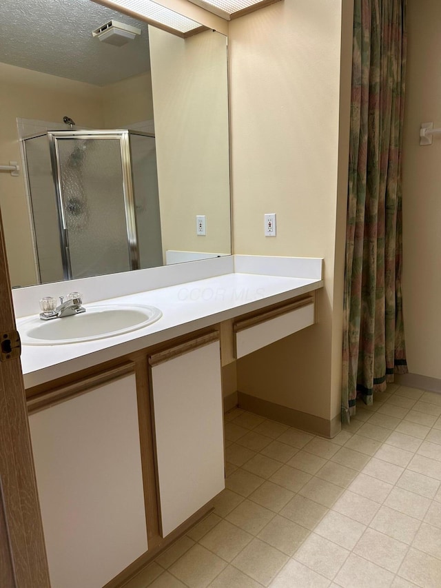 2328 Willowside Ln, Grove City, OH 43123 - bathroom featuring a stall shower, vanity, and tile patterned floors