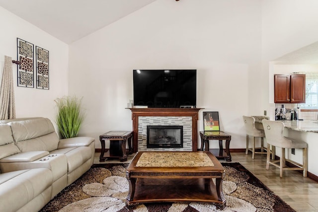 729 Lilly Landing Ln, Blacklick, OH 43004 - living room featuring high vaulted ceiling, light wood finished floors, and a fireplace
