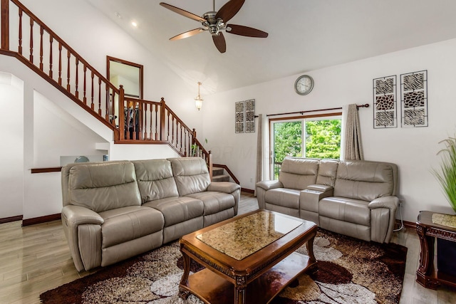 729 Lilly Landing Ln, Blacklick, OH 43004 - living room featuring stairway, wood finished floors, ceiling fan, and high vaulted ceiling