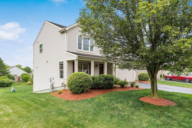 1553 Grove Hill Dr, Columbus, OH 43240 - view of front of home featuring a front lawn, driveway, and an attached garage