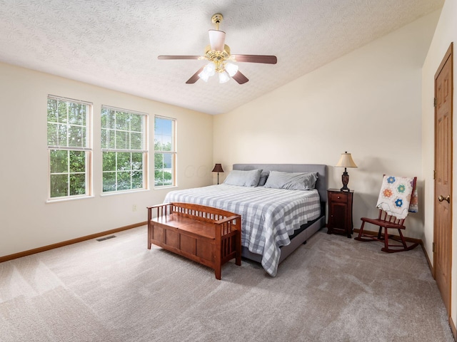 1553 Grove Hill Dr, Columbus, OH 43240 - bedroom with carpet flooring, a textured ceiling, a ceiling fan, and vaulted ceiling
