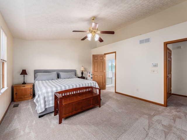 1553 Grove Hill Dr, Columbus, OH 43240 - bedroom featuring vaulted ceiling, light colored carpet, a textured ceiling, and a ceiling fan