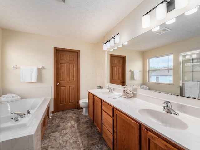 1553 Grove Hill Dr, Columbus, OH 43240 - full bath with a bath, double vanity, a shower with shower door, and a textured ceiling