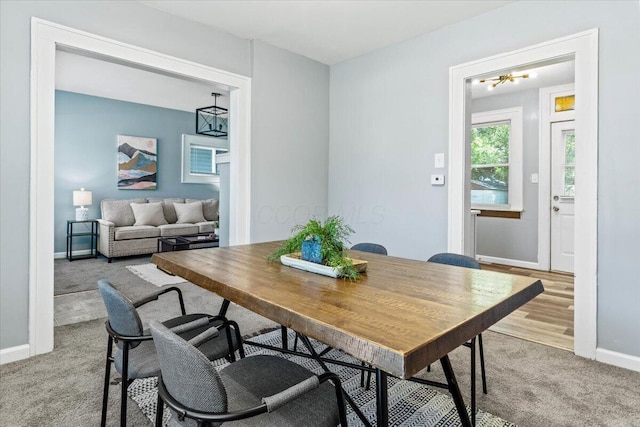 364 Clarendon Ave, Columbus, OH 43223 - dining area featuring light colored carpet and baseboards