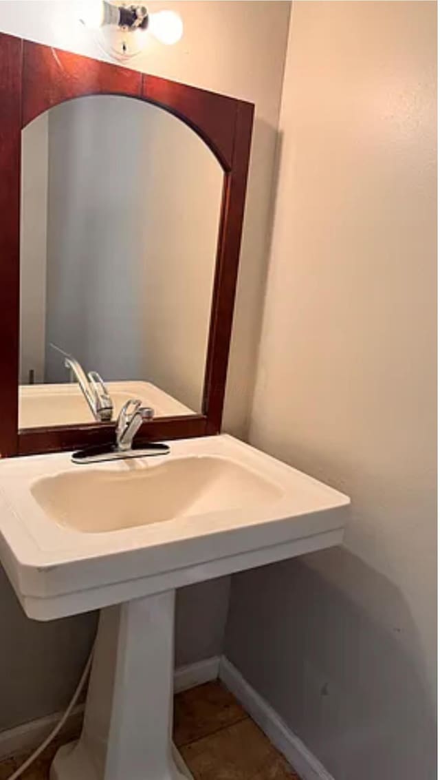 991 Hidden Acres Ct, Columbus, OH 43224 - bathroom with tile patterned floors and a sink
