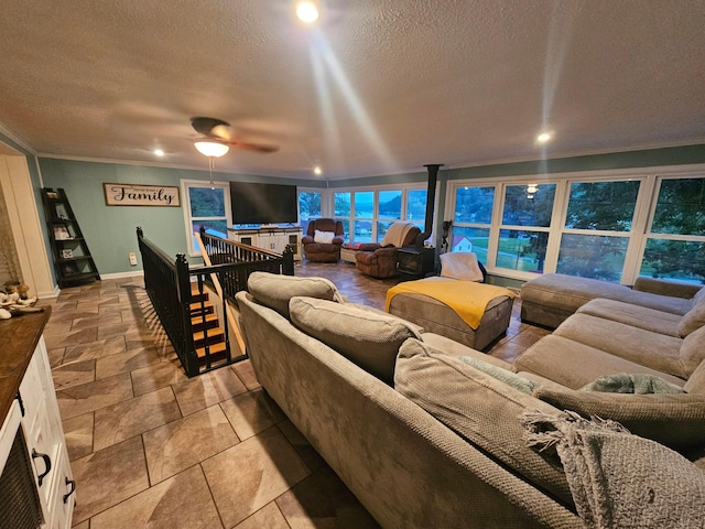 45 Shady Ln Unit 552On, Waverly, OH 45690 - living area with ornamental molding, a textured ceiling, and ceiling fan