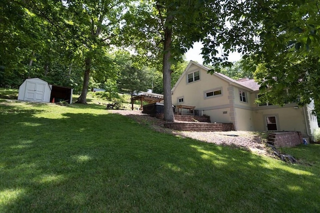 45 Shady Ln Unit 552On, Waverly, OH 45690 - view of green lawn featuring a storage shed