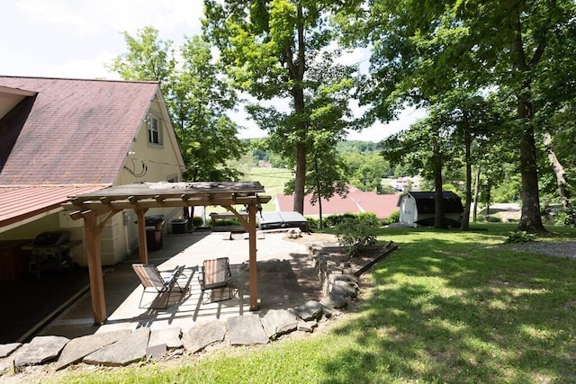 45 Shady Ln Unit 552On, Waverly, OH 45690 - view of grassy yard featuring a patio area and a storage unit