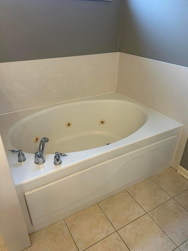 1021 Taylor Glen Blvd E, Pataskala, OH 43062 - bathroom featuring a jetted tub and tile patterned floors