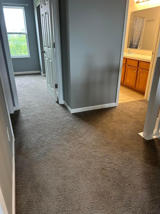 1021 Taylor Glen Blvd E, Pataskala, OH 43062 - hallway with light carpet and baseboards