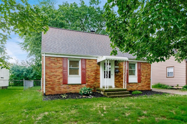 3064 Melva Ave, Columbus, OH 43224 - view of front of property featuring roof with shingles and brick siding