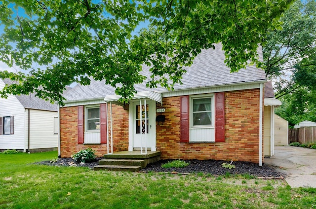 3064 Melva Ave, Columbus, OH 43224 - view of front of home with roof with shingles and brick siding