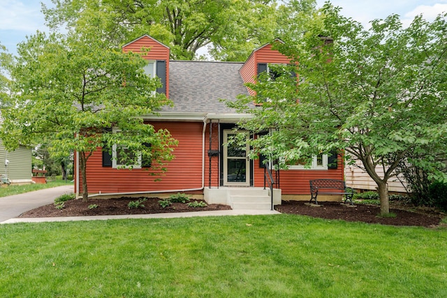 98 N Chesterfield Rd, Columbus, OH 43209 - view of front of home featuring a chimney, a front lawn, and roof with shingles