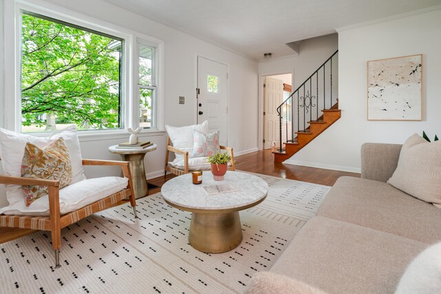 98 N Chesterfield Rd, Columbus, OH 43209 - living room with wood finished floors, stairway, and crown molding
