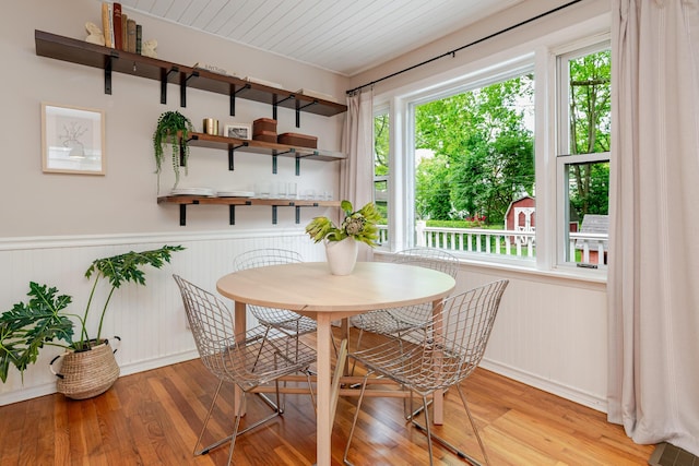 98 N Chesterfield Rd, Columbus, OH 43209 - dining room with wood finished floors and a wainscoted wall