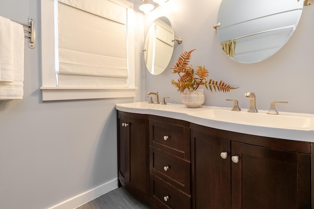 98 N Chesterfield Rd, Columbus, OH 43209 - bathroom with double vanity and baseboards