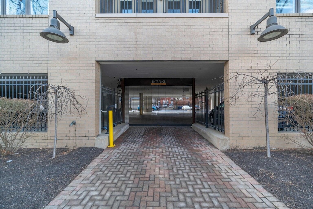 825 N 4th St Unit 307, Columbus, OH 43215 - view of exterior entry featuring brick siding