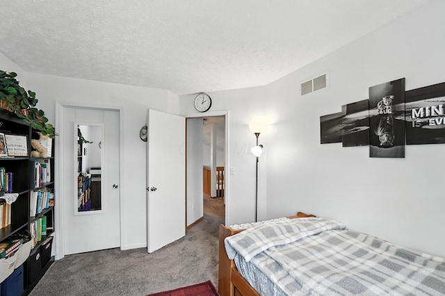 906 Linkfield Dr, Columbus, OH 43085 - bedroom featuring carpet flooring and a textured ceiling