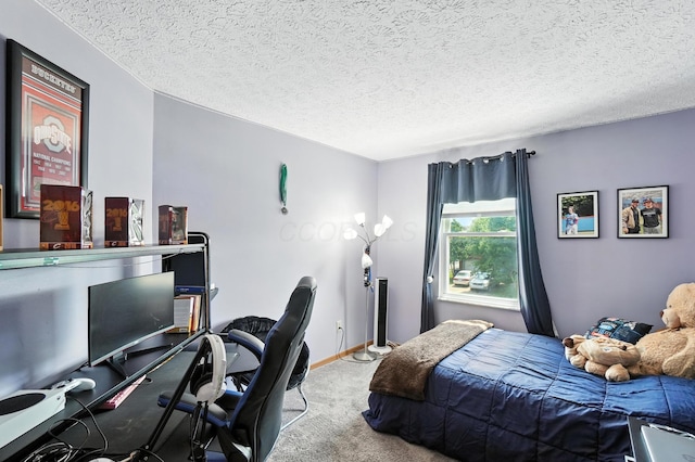 906 Linkfield Dr, Columbus, OH 43085 - bedroom with carpet floors, an office area, and a textured ceiling