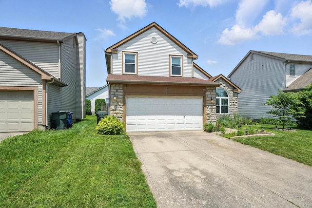 906 Linkfield Dr, Columbus, OH 43085 - traditional-style house with driveway, stone siding, a front lawn, and an attached garage