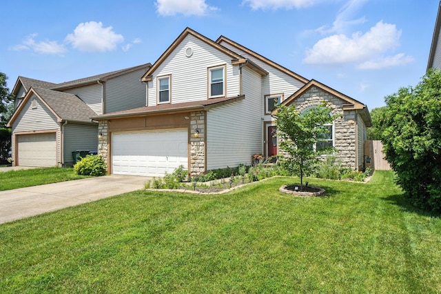 906 Linkfield Dr, Columbus, OH 43085 - traditional home with stone siding, concrete driveway, and a front lawn