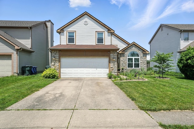 906 Linkfield Dr, Columbus, OH 43085 - traditional-style house featuring stone siding, a front lawn, an attached garage, and concrete driveway