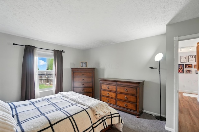 906 Linkfield Dr, Columbus, OH 43085 - bedroom featuring baseboards and a textured ceiling