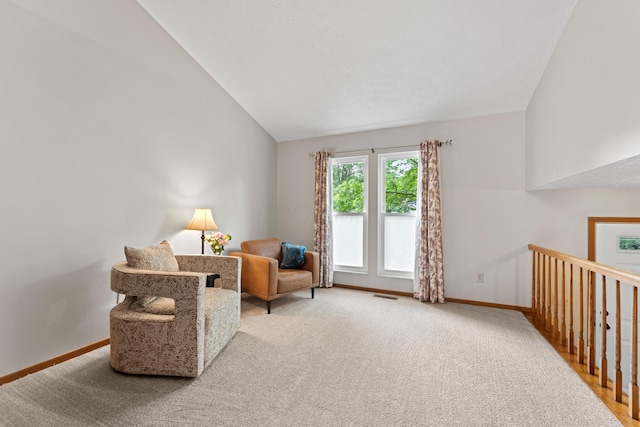 3550 Whisper Creek Dr, Columbus, OH 43231 - living area featuring vaulted ceiling and carpet