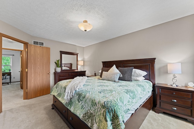3550 Whisper Creek Dr, Columbus, OH 43231 - bedroom with light carpet and a textured ceiling