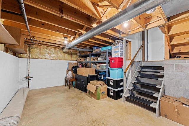 3550 Whisper Creek Dr, Columbus, OH 43231 - unfinished below grade area featuring stairs and concrete block wall