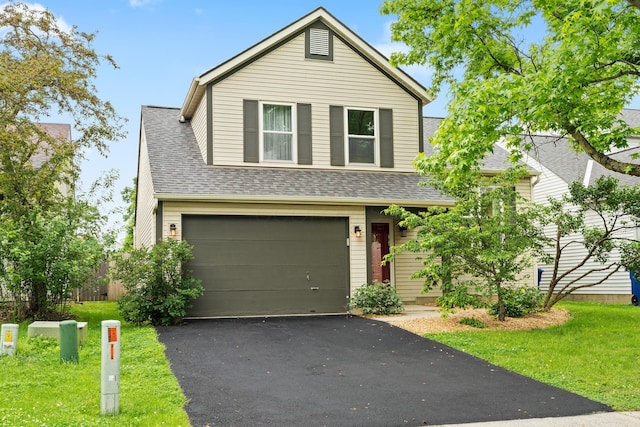 3550 Whisper Creek Dr, Columbus, OH 43231 - traditional-style house with a garage, asphalt driveway, a shingled roof, and a front yard