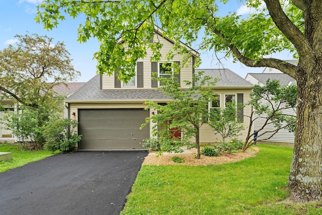 3550 Whisper Creek Dr, Columbus, OH 43231 - traditional-style home with driveway, roof with shingles, a front lawn, and an attached garage