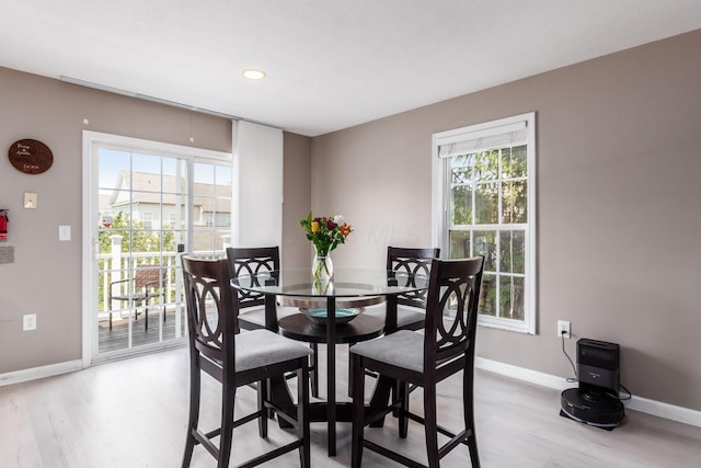 5588 Bow Falls Blvd Unit 35-558, Dublin, OH 43016 - dining space with light wood finished floors, plenty of natural light, and recessed lighting
