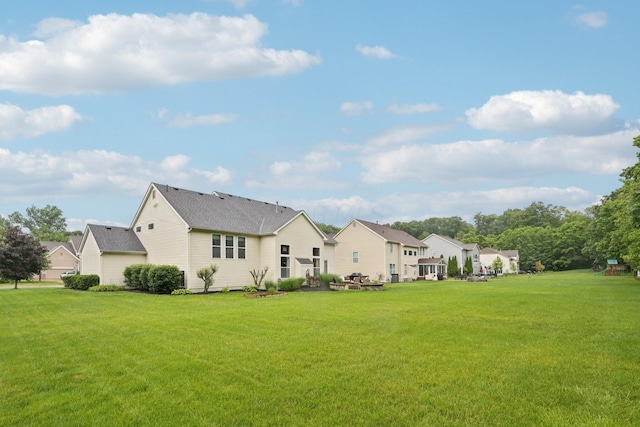 13946 Bainwick Dr NW, Pickerington, OH 43147 - rear view of property featuring a yard