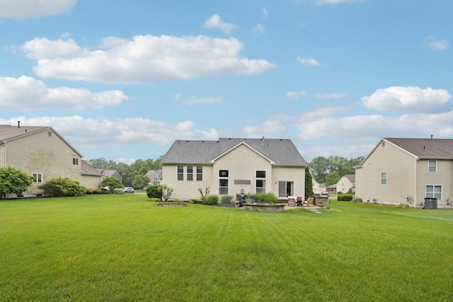 13946 Bainwick Dr NW, Pickerington, OH 43147 - back of house featuring a lawn